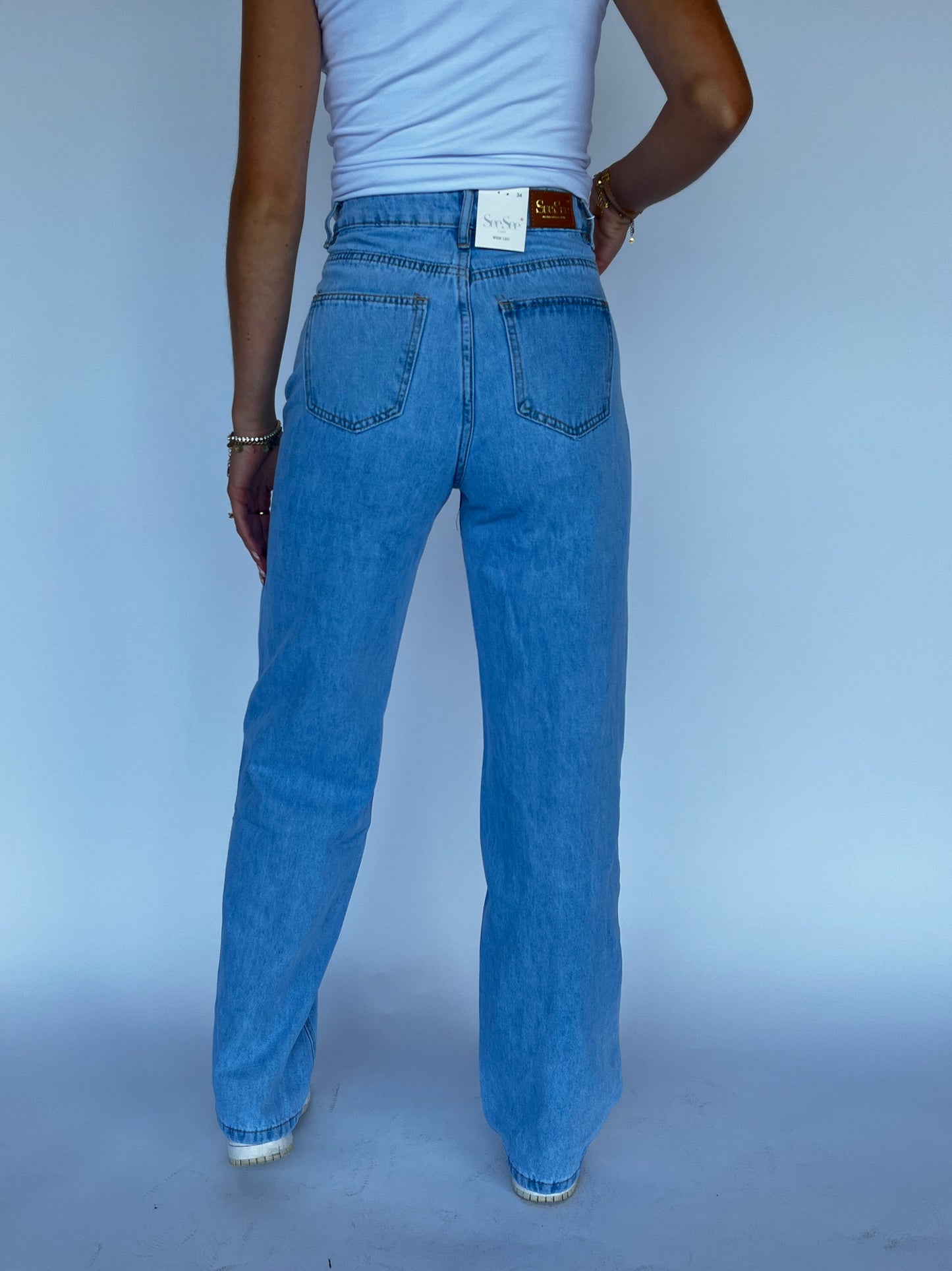 ASYMMETRICAL JEANS